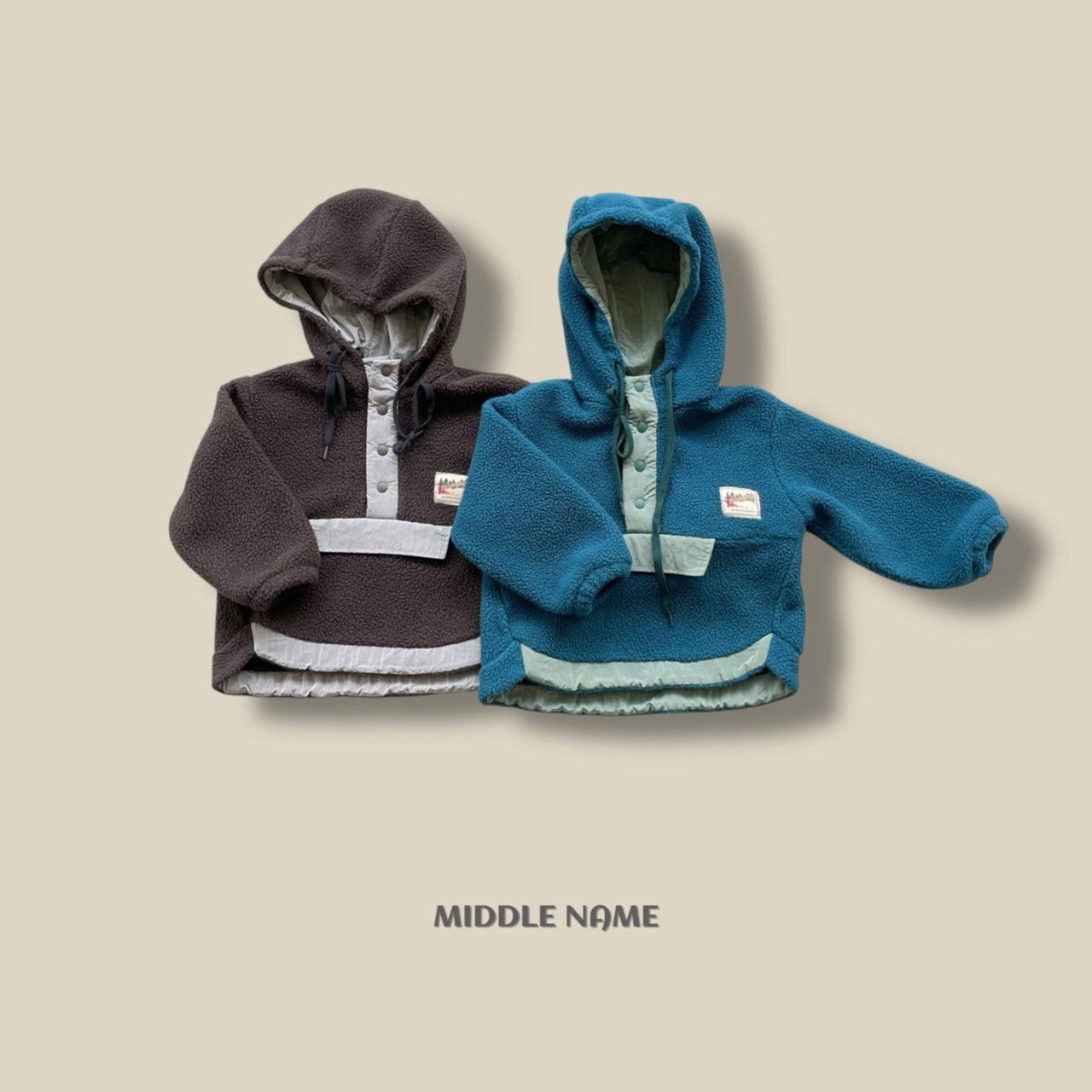 【予約】fleece hood anorak / middle name (S-JM)