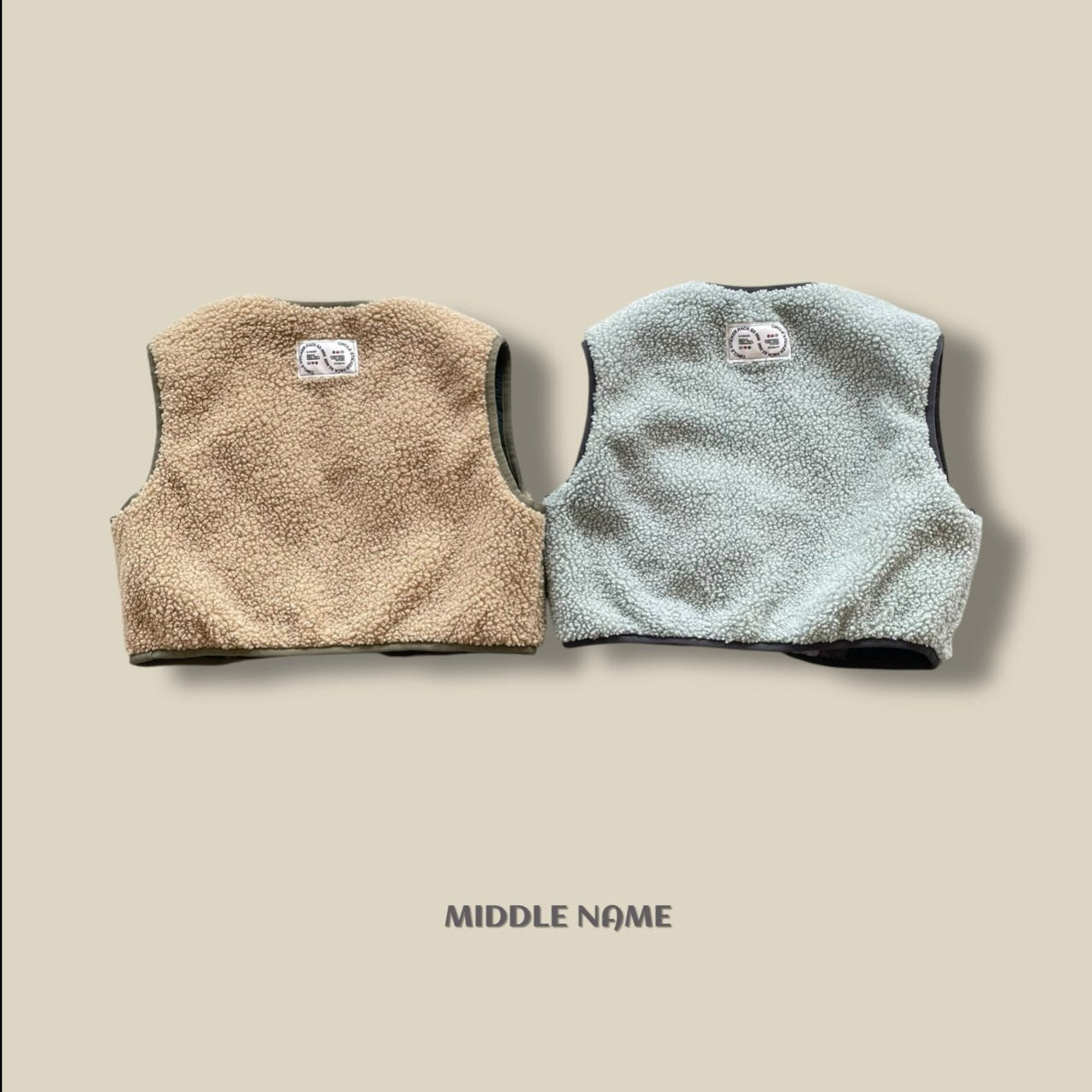 【予約】camouflagey reversible vest  / middle name (S-JM)
